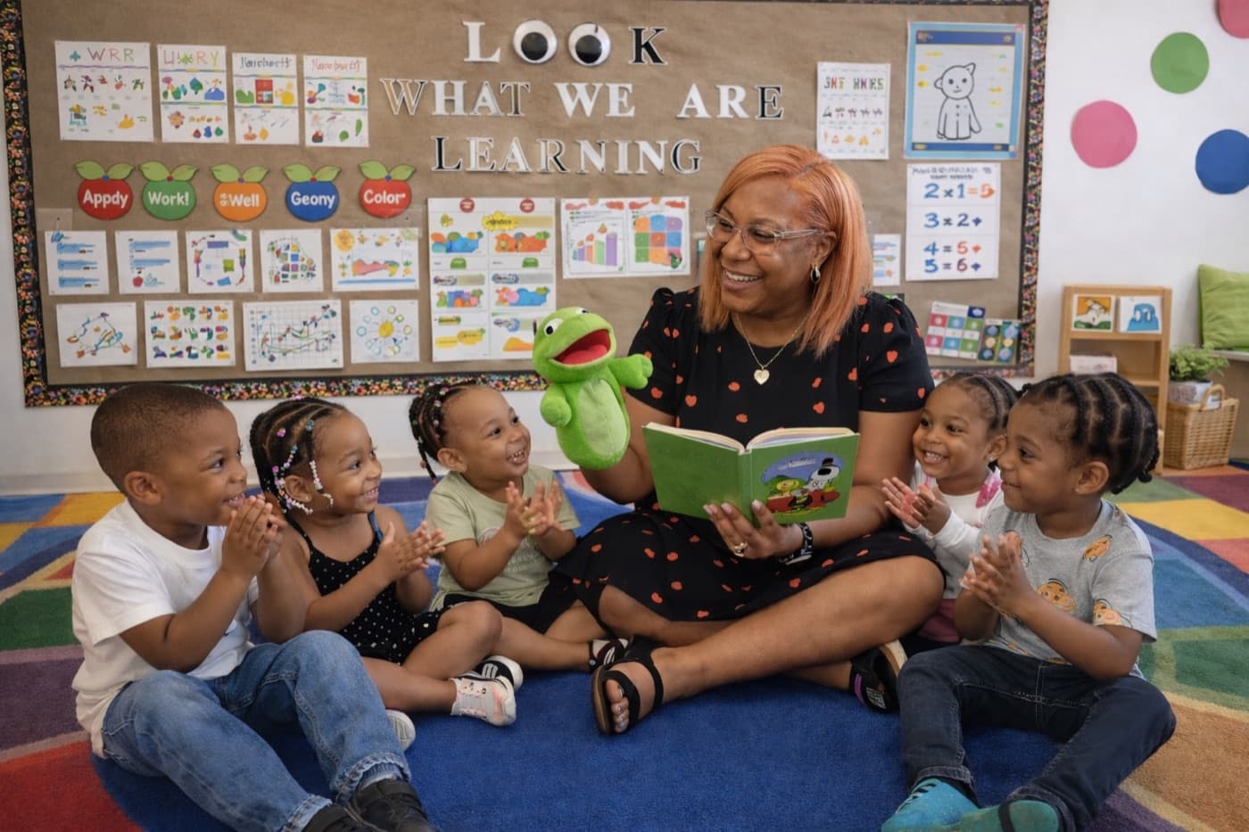 Teacher reading with children